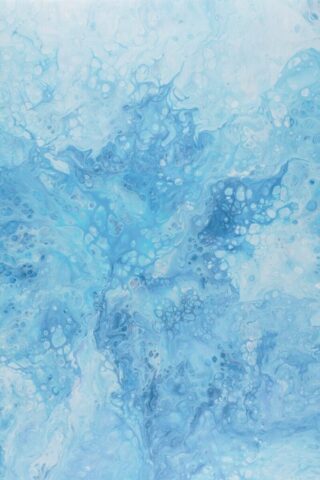 Photo by Cocodillaa.com an abstract painting of blue and white colors