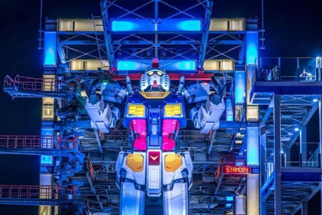 a giant robot that is standing in the dark