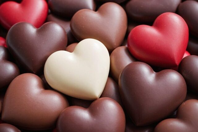 Photo by cocodillaa.com hearts, chocolate, love, candy, romance, valentine, sweet, heart chocolate, valentines candy, milk chocolate, white chocolate, dark chocolate, romantic gift, sweet treat, valentines day chocolate gift, romantic sweet gift, ai generated, love wallpaper, love background, brown background, brown wallpaper