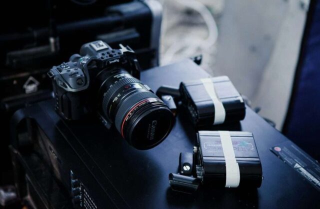 A camera sitting on top of a black table
