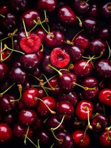 a group of red cherries