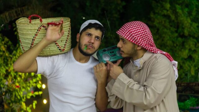 Photo by Cocodillaa.com two men holding objects