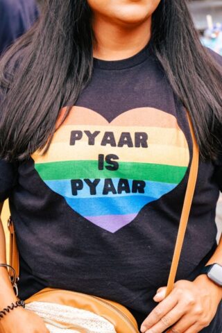 Photo by Cocodillaa.com a woman is wearing pyaar shirt