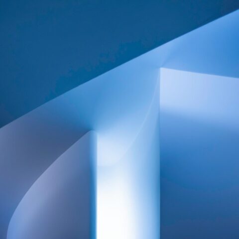 Photo by Cocodillaa.com an abstract photograph of a curved wall