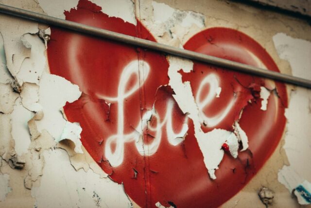 Photo by Cocodillaa.com red and white love neon sign