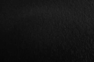 Photo by Cocodillaa.com a black and white photo of a black surface