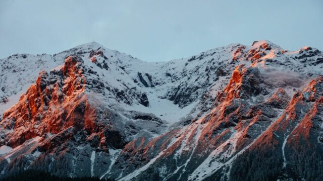 Photo by Cocodillaa.com photo of mountain covered of snow during cloudy sky