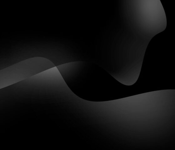 a black and white abstract background with wavy lines