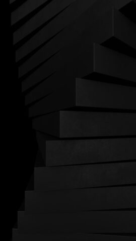 a stack of black boxes sitting on top of each other