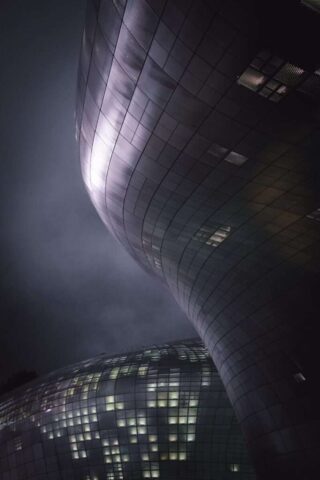 A very tall building with a lot of lights on it