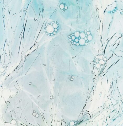 Photo by Cocodillaa.com a painting of water and bubbles on a blue background