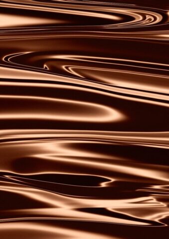 Photo by Cocodillaa.com a brown background with wavy lines