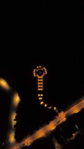 Aerial view of illuminated structure at night
