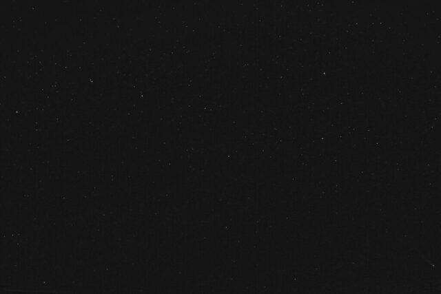 black textile on black background