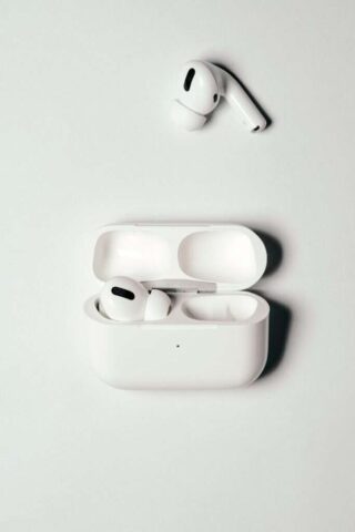 white apple earpods in white case