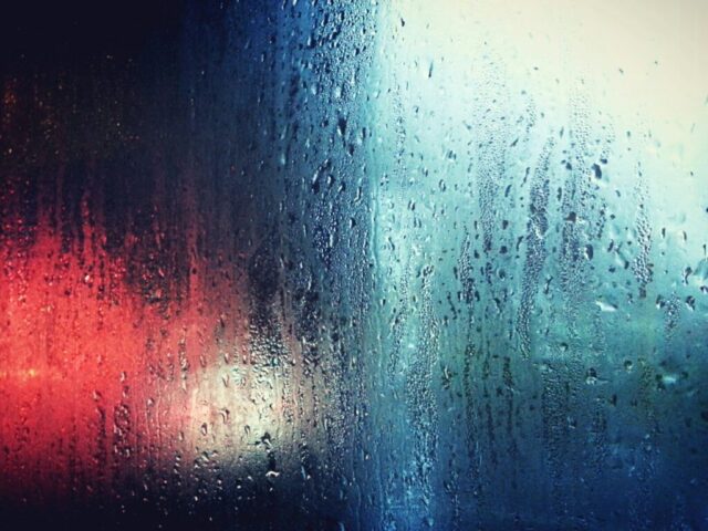 Photo by Cocodillaa.com a close up of a window with rain drops