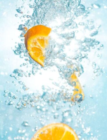 Photo by Cocodillaa.com sliced orange fruits underwater