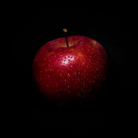 a red apple with a stem