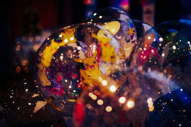 Photo by Cocodillaa.com a bunch of balloons that have pikachu on them