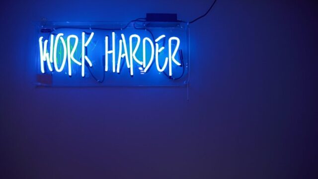 Photo by Cocodillaa.com blue Work Harder neon signage