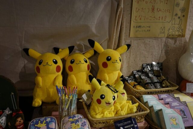 Photo by Cocodillaa.com a group of stuffed pikachu sitting on top of a table