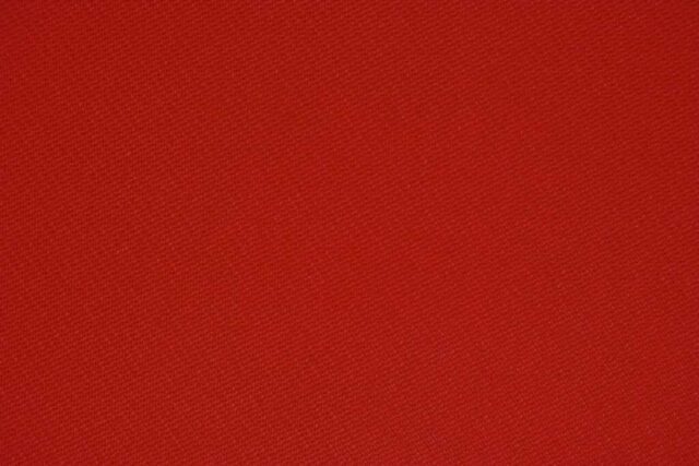 red textile in close up photography