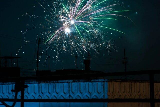 Photo by Cocodillaa.com A large fireworks is lit up in the night sky