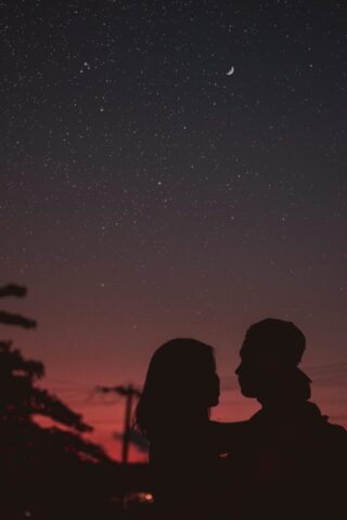 Photo by Cocodillaa.com silhouette of woman hugging mna under starry night sky