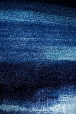 Photo by Cocodillaa.com a dark blue area with a white stripe on it