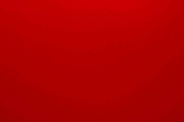 red textile in close up photography