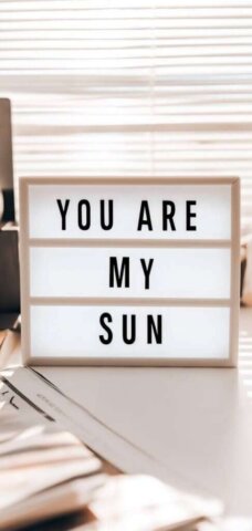 Lightbox displays "you are my sun" message.