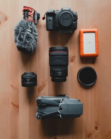 Photo by Cocodillaa.com a camera, a microphone, a camera lens, a microphone, and other items