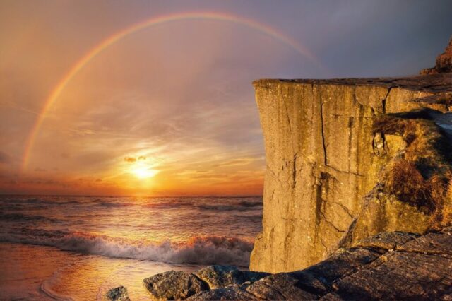 Photo by Cocodillaa.com landscape, fantasy, sea, rainbow, cliff, nature, sun, wave, beach