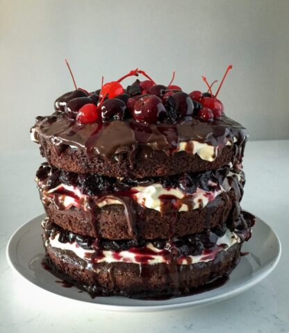 Photo by Cocodillaa.com chocolate cake with strawberry on white ceramic plate