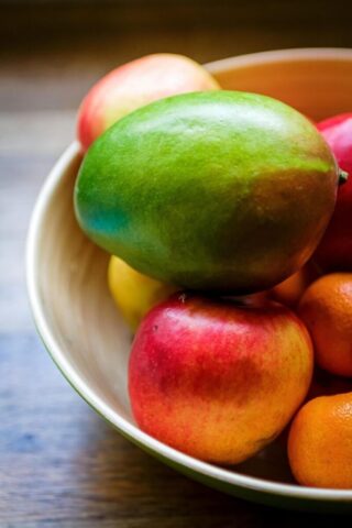 Photo by cocodillaa.com fruits, mango, apple, healthy, still life, fruit basket, tangerine, food