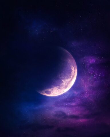 Photo by Cocodillaa.com a purple and blue sky with a half moon