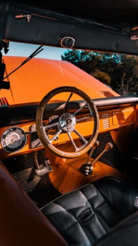 the interior of a car with a steering wheel