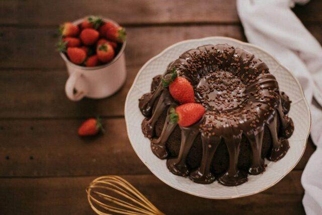 Photo by Cocodillaa.com chocolate cake with strawberry on white ceramic plate