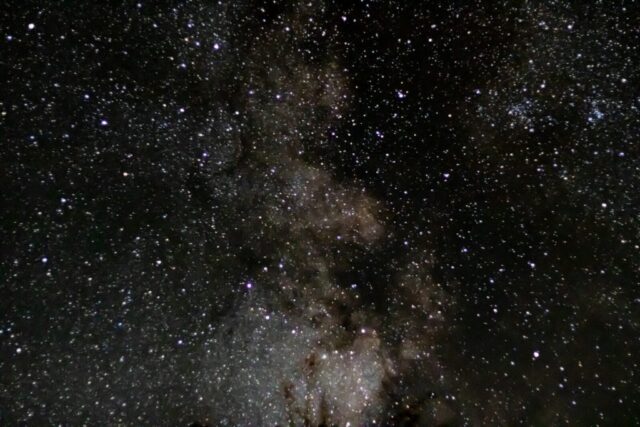 the night sky is filled with stars and clouds the night sky is filled with stars and clouds