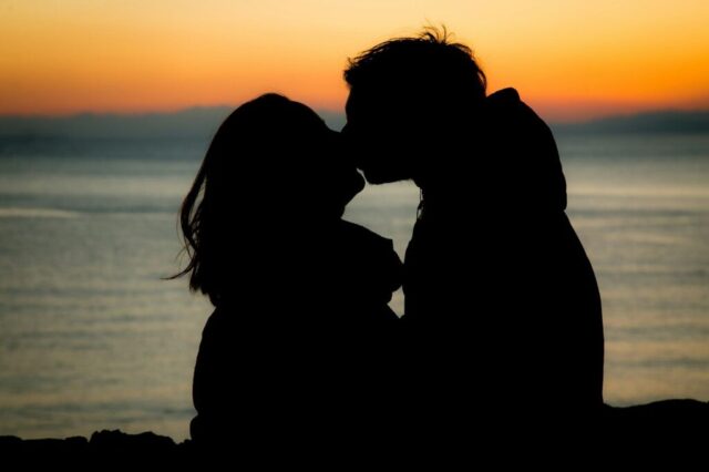Photo by Cocodillaa.com silhouette of couple kissing during sunset