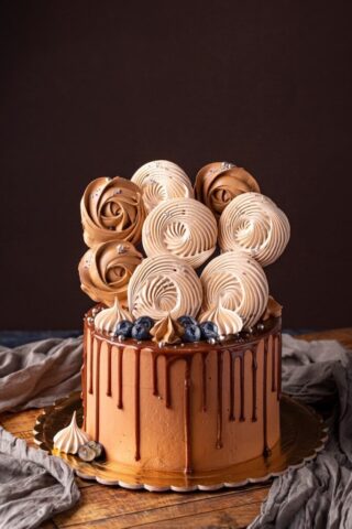 Photo by Cocodillaa.com a chocolate cake with chocolate icing and chocolate swirls
