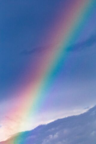 Photo by Cocodillaa.com rainbow over the clouds during daytime