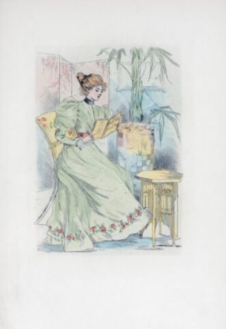 Woman in a green dress reading a book