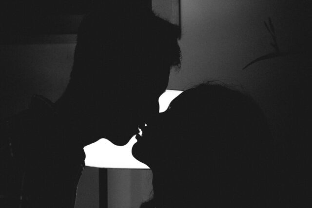 Photo by Cocodillaa.com silhouette of man and woman kissing