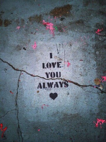 a white surface with a black and red text on it