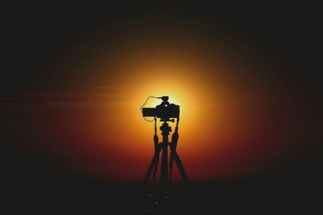 Photo by Cocodillaa.com silhouette of camera in tripod