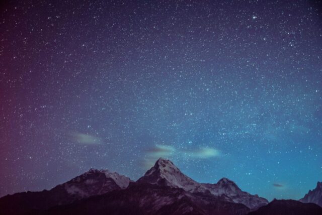 icy mountains under starry night icy mountains under starry night