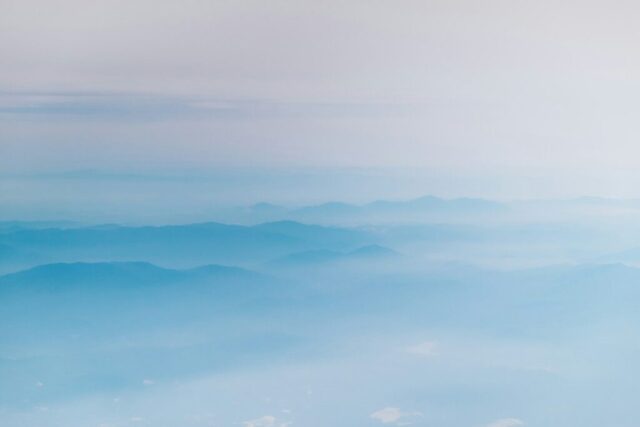 mountain covering with clouds
