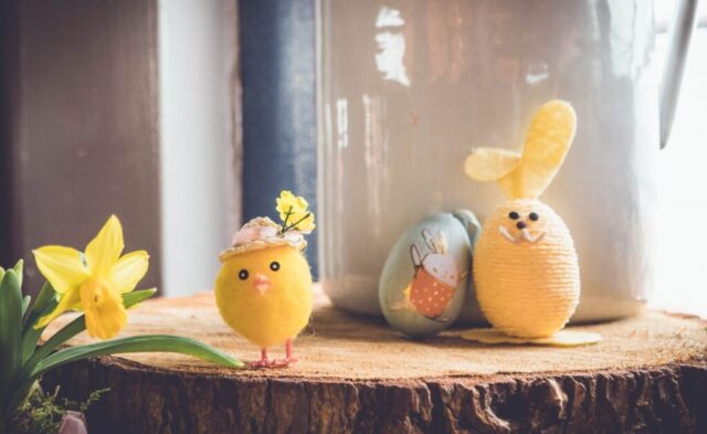 Photo by Cocodillaa.com yellow bird plush toy on brown wood