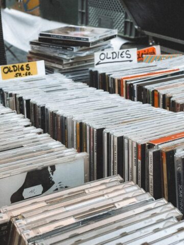 A large collection of cds on a table